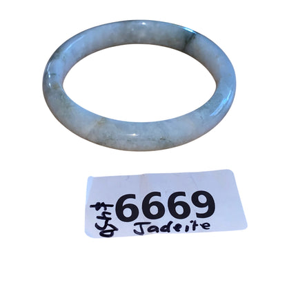 Jadeite Bangle Bracelet Grade A Natural Green Hues Polished Finish Elegant Design Timeless Style For Jewelry Enthusiasts